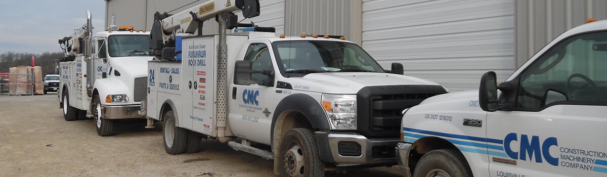CMC service trucks in line